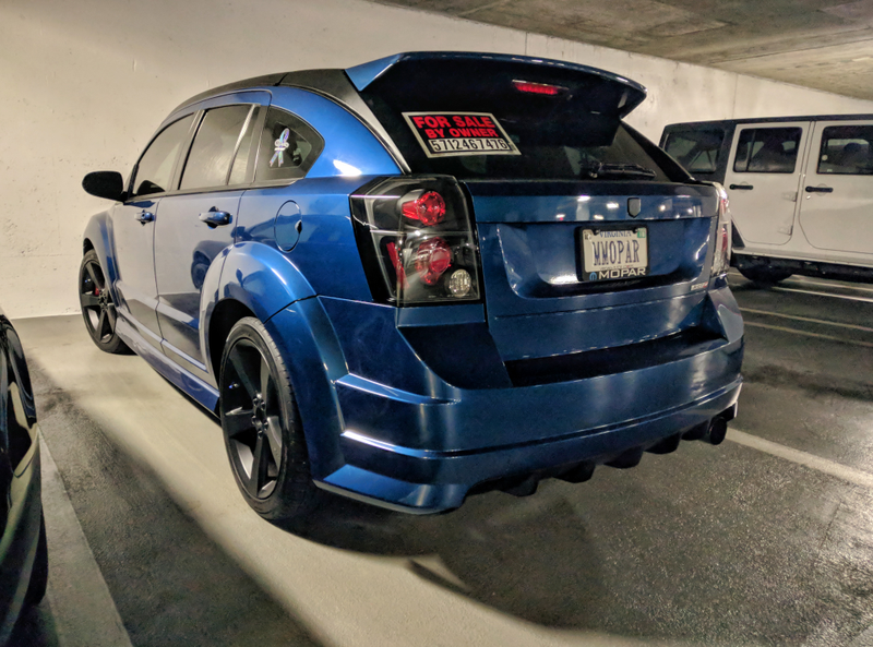 Illustration for article titled There are not one, but two, SRT vehicles with Mopar-themed vanity plates in my office parking garage